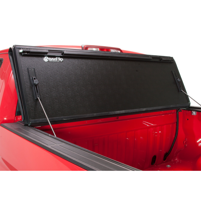 BAK BAKFlip FiberMax Hard Folding Truck Bed Cover - Rail Mounts Near Top of Bed Rail - Rails Can Be Lowered Using Drop Down Brackets - 22-24 Toyota Tundra 5' 7" Bed with or without Deck Rail System w/out Trail Special Edition Storage Boxes Model 1126440