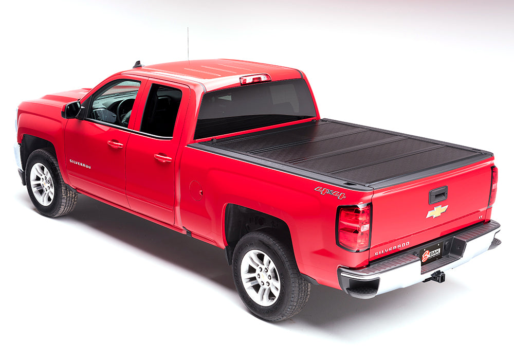 BAK BAKFlip F1 Hard Folding Truck Bed Cover - Rails Mounted Low Enough To Use Standard C Clamps - 2004-2013 Chevy Silverado/GMC Sierra 5' 9" Bed Model 772100