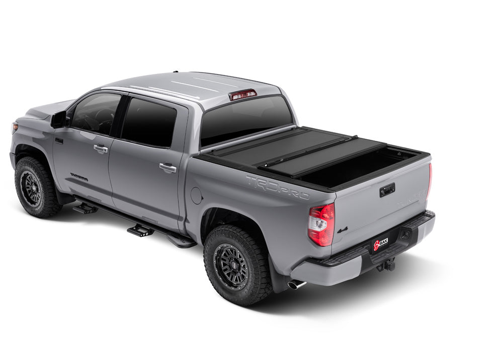 BAK BAKFlip MX4 Hard Folding Truck Bed Cover - Matte Finish - 2007-2021 Toyota Tundra 6' 6" Bed with Deck Rail System without Trail Special Edition Storage Boxes Model 448410T